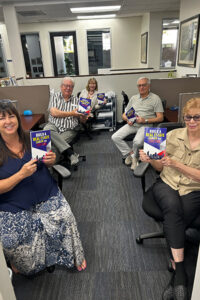 Real estate agents with a book